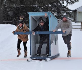 Outhouse Races at the Yaak River Tavern and Mercantile