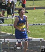 Cole runs the hurdles. Photo by LibbyMT.com.