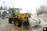 Clearing Snow. Photo by Kootenai Valley Record.