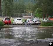 Flooded parking lot. Photo by LibbyMT.com.