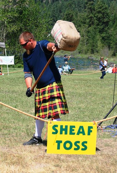 Sheaf toss. Photo by LibbyMT.com.