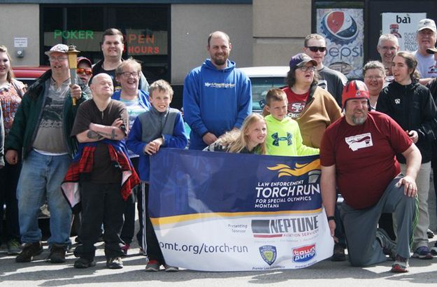Torch Run Banner and Flame. Photo by LibbyMT.com.