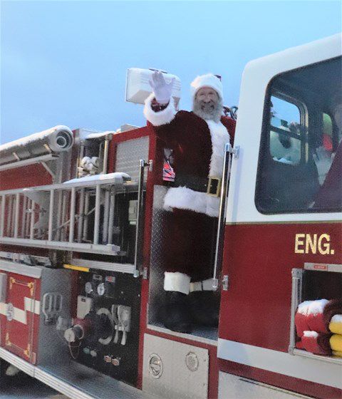 Santa arrives. Photo by LibbyMT.com.