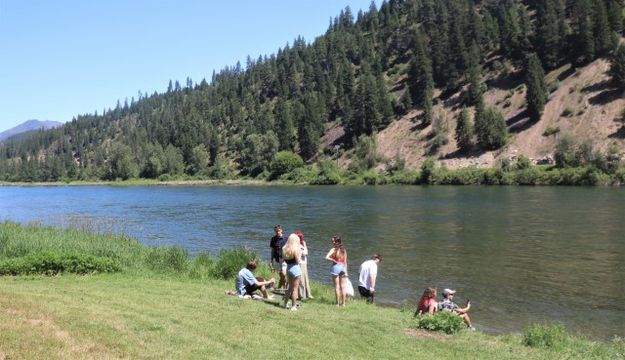 Cooling off by the river. Photo by LibbyMT.com.