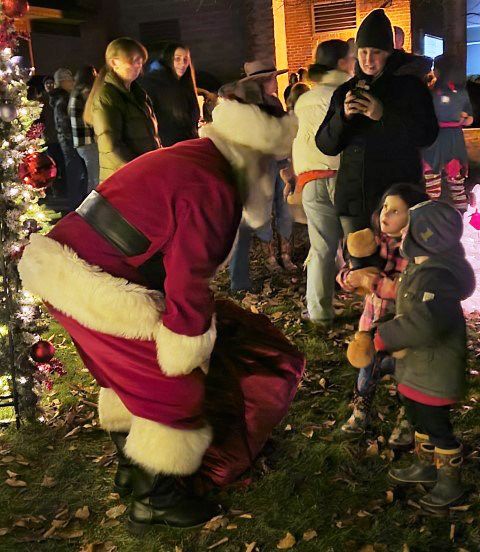 Face to face with Santa. Photo by LibbyMT.com.