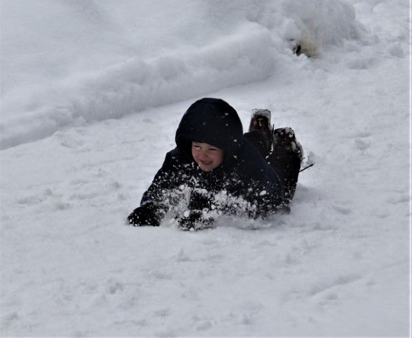 Snow is for sliding. Photo by LibbyMT.com.