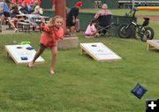Cornhole action. Photo by LibbyMT.com.