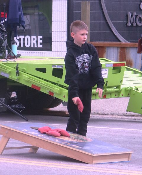 Cornhole practice. Photo by LibbyMT.com.