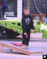 Cornhole practice. Photo by LibbyMT.com.