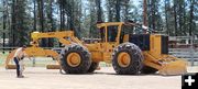 Checking out the really big skidder. Photo by LibbyMT.com.