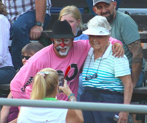 <center>Mike Wallace</center> <center>with a rodeo fan</center>. Photo by LibbyMT.com.