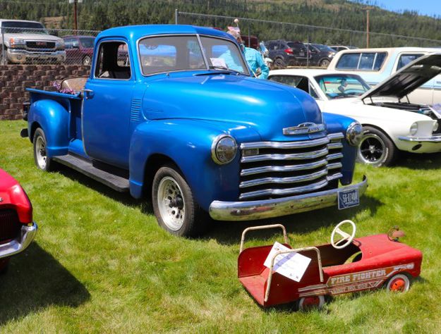 1950 Chevrolet pickup and 1959 Plymouth fire truck. Photo by LibbyMT.com.