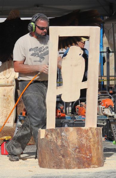 <center>Josh Miller works on a</center> <center>quick carve on Saturday</center>. Photo by LibbyMT.com.