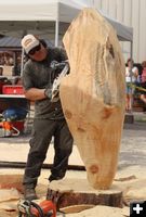 <center>George works on</center> <center>a quick carve</center>. Photo by LibbyMT.com.